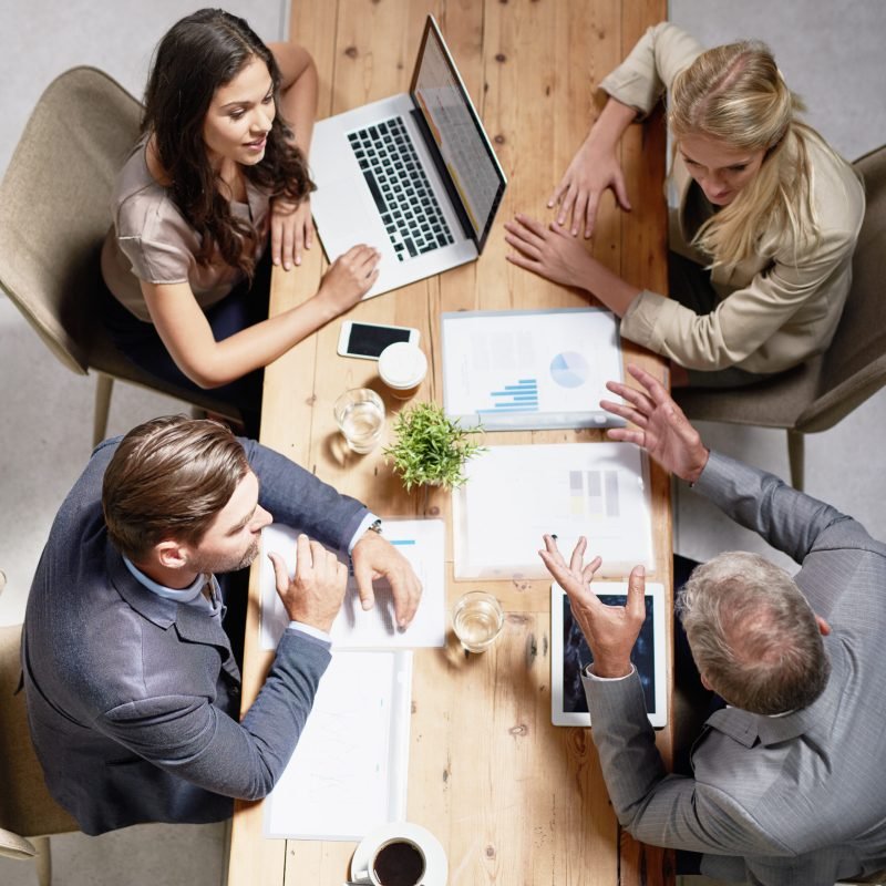 Shot of professional colleagues working together in a modern office.